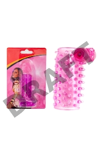 Розовая сквозная вибронасадка на пенис с шипами